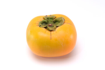 Sweet fresh ripe persimmon isolated on white background