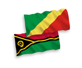 National vector fabric wave flags of Republic of Vanuatu and Republic of the Congo isolated on white background. 1 to 2 proportion.