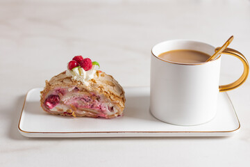 Meringue roll cake with berries whipped cream and coffe on marble background. Copy space.