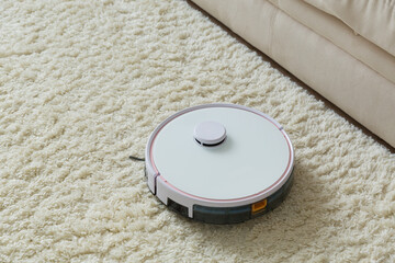 Robot vacuum cleaner drives on the carpet