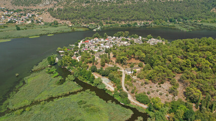 Fototapeta premium Aerial drone photo of beautiful small inhabited island in lake Pamvotida of Ioannina featuring Ali Pasha and Revolutionary Period Museum, Epirus, Greece