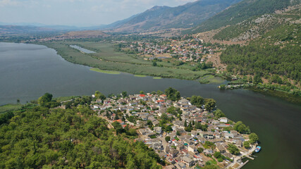 Aerial drone photo of beautiful small inhabited  island in lake Pamvotida of Ioannina featuring Ali...