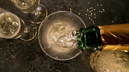 Super slow motion of pouring champagne into glass with camera motion. Filmed on high speed cinema camera, 1000 fps. - Powered by Adobe