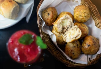 fried chicken balls in a basket, chicken snack with side dishes