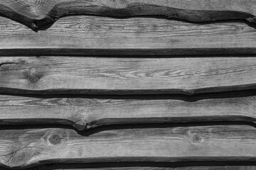 Abstract natural wooden background. Black and white decorative wallpaper. Close up.