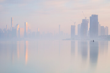 Fototapeta na wymiar East River view on a foggy day during sunrise