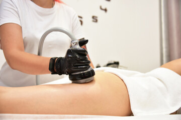 Hardware cosmetology. Body care. Non surgical body sculpting. Ultrasound cavitation body contouring...