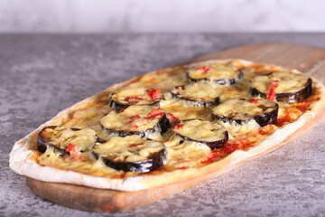 vegetarian pizza with eggplant tomato and cheese