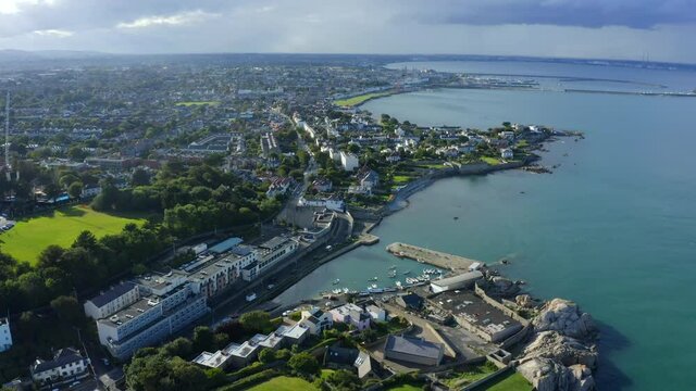 Bullock Harbour, Dalkey, Dublin, Ireland, September 2021. Drone gradually orbits from the east towards Castle Park School with Sandycove and D&uacute;n Laoghaire in the background.
