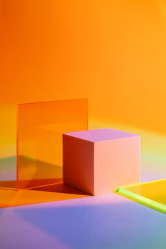 Cube podium with acrylic plate  on colorful gradient background. Stylish geometric shapes to show  products.