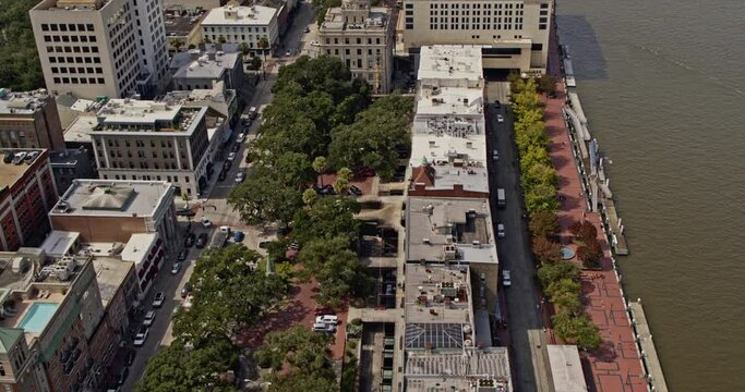 Savannah Georgia Aerial v46 birds eye view pull out shot along the river, tilt up reveals historic downtown and yamacraw village cityscape - Shot with Inspire 2, X7 camera - October 2020