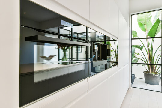 Modern kitchen interior with built in appliances at home