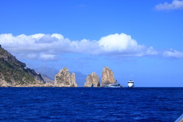 Naklejka premium The Faraglioni Rocks on the coast of the island of Capri, Italy