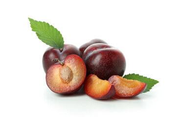 Plums with leaves isolated on white background