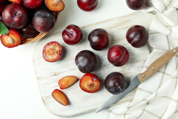 Concept of fruit with plums on a white background