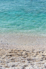 Capobianco beach in Elba Island, Italy. White pebbles and cristal clear turquoise water