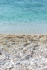 Capobianco beach in Elba Island, Italy. White pebbles and cristal clear turquoise water