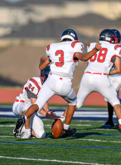 Amazing athletes making great catches and runs during a competitive football game