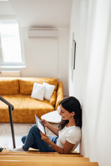 Adult woman, looking at her bank balance.