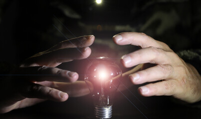 the man who wants to explain the increasing energy costs with a light bulb