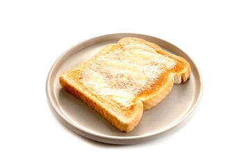 Toasted slice of bread and butter. Breakfast snack sandwich isolated on white