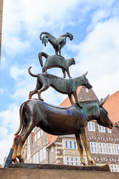 Bremen, Germany - June 28, 2019: Famous monument to the Bremen Town Musicians near the Bremen Town Hall (Donkey, Dog, Cat, Rooster)