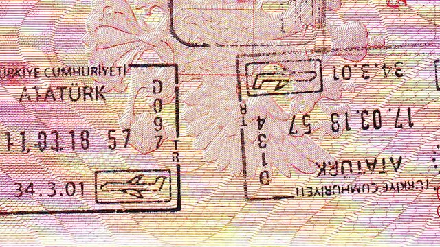 Passport, visa of arrival, departure, macro view. Turkish stamp.