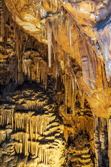 Scene from The "Saeva Dupka" cave located in Northern Bulgaria. It is a stunning natural cave with absolutely gorgeous, filled with massive stalagmites, stalactites, and other cave formations.