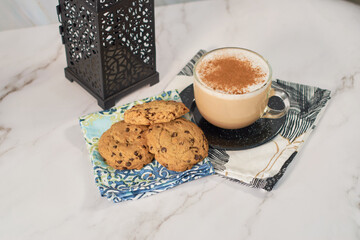 Still life of cookies and coffee cup. Relaxation concept in coffee break.