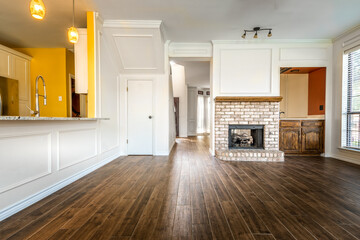 Empty living room in a private residence with a fire place