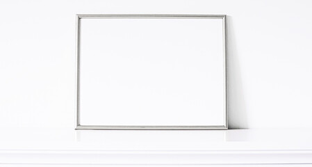 Silver frame on white furniture, luxury home decor and design for mockup, poster print and...
