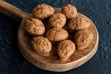 Carrot and cinnamon cake on dark background