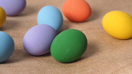 Easter eggs or color egg. Multi-colorful of easter eggs on background in studio with close-up shot which include many colour such as yellow, green, blue, purple, red on festival eggs by art painting.