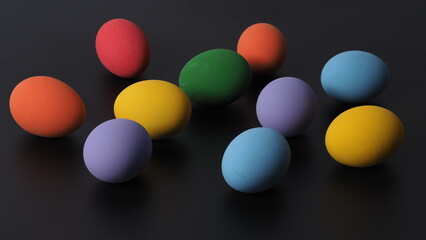 Easter eggs or color egg. Multi-colorful of easter eggs on background in studio with close-up shot which include many colour such as yellow, green, blue, purple, red on festival eggs by art painting.