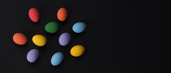 Easter eggs or color egg. Multi-colorful of easter eggs on background in studio with close-up shot which include many colour such as yellow, green, blue, purple, red on festival eggs by art painting.
