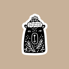 Christmas Black vector sticker with cute and funny bear. Hand drawn scandinavian badge character for notebook, scrapbook, smartphone or planner. flat graphic isolated illustration