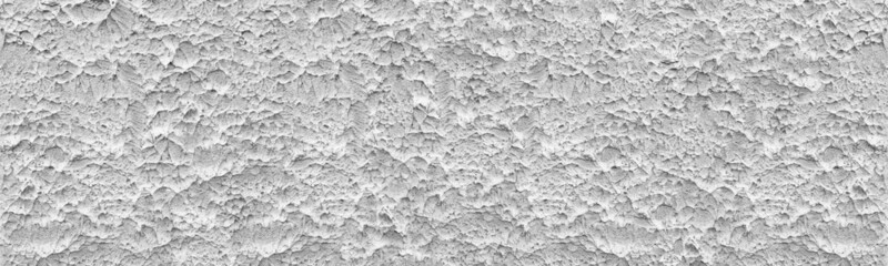 Gray rough concrete wall panoramic texture. Textured cement plaster surface panorama. Grey backdrop. Wide grunge abstract background