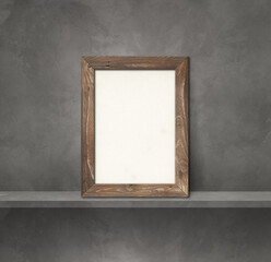 Wooden picture frame leaning on a grey shelf. 3d illustration. Square background