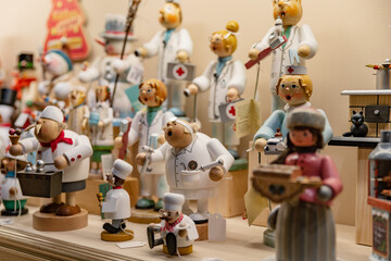 Traditional wooden Christmas toys on the showcase