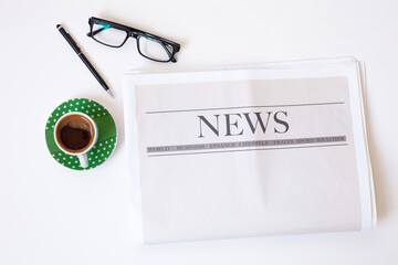 Reading newspaper on white background