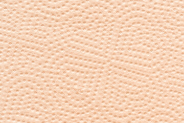 デコボコした薄橙色の背景画像