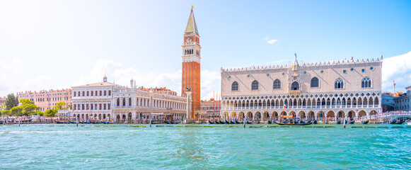 Venice historical center waterfront. Landmarks around St Mark Square with St Mark Campanile and...