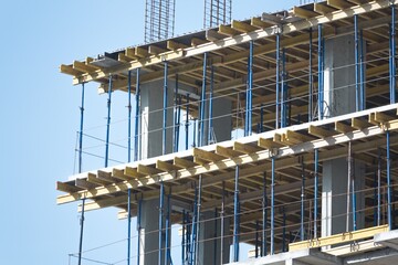 Engineer technician workers on building background