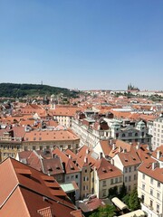 Fototapeta na wymiar Red tiled roofs of historic architecture buildings in the old town of Prague, Czech Republic