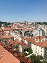 Obraz premium Red tiled roofs of historic architecture buildings in the old town of Prague, Czech Republic