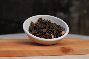 Tea leaves in a small bowl
