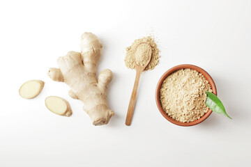 Dry and fresh ginger in bowl isolated on white background