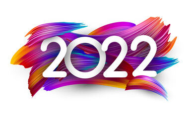 2022 white sign on brush strokes background. - obrazy, fototapety, plakaty