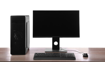 Modern computer with blank monitor screen and peripherals on wooden table against white background