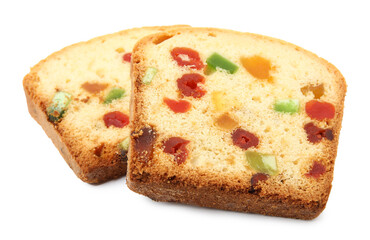Slices of delicious cake with candied fruits on white background